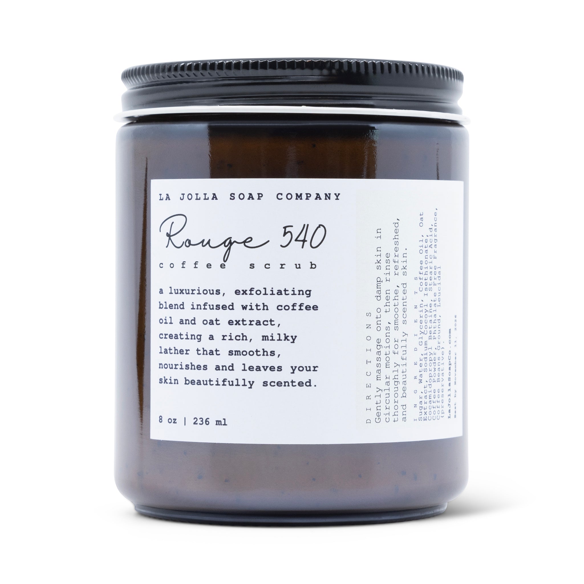 Dark amber jar of La Jolla Soap Company Rouge 540 Coffee Scrub with a minimalist white label, featuring the product name in elegant script and a brief description of the luxurious, exfoliating blend infused with coffee oil and oat extract.