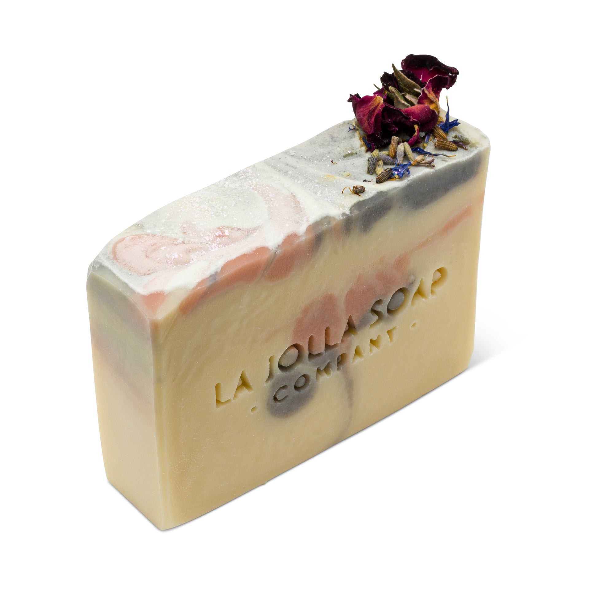 A handcrafted Milky Rose and Lavender Goat Milk Soap with a creamy, soft white base and delicate pink swirls. The top is adorned with a shimmering gold finish and dried rose petals creating an elegant, floral-inspired design.