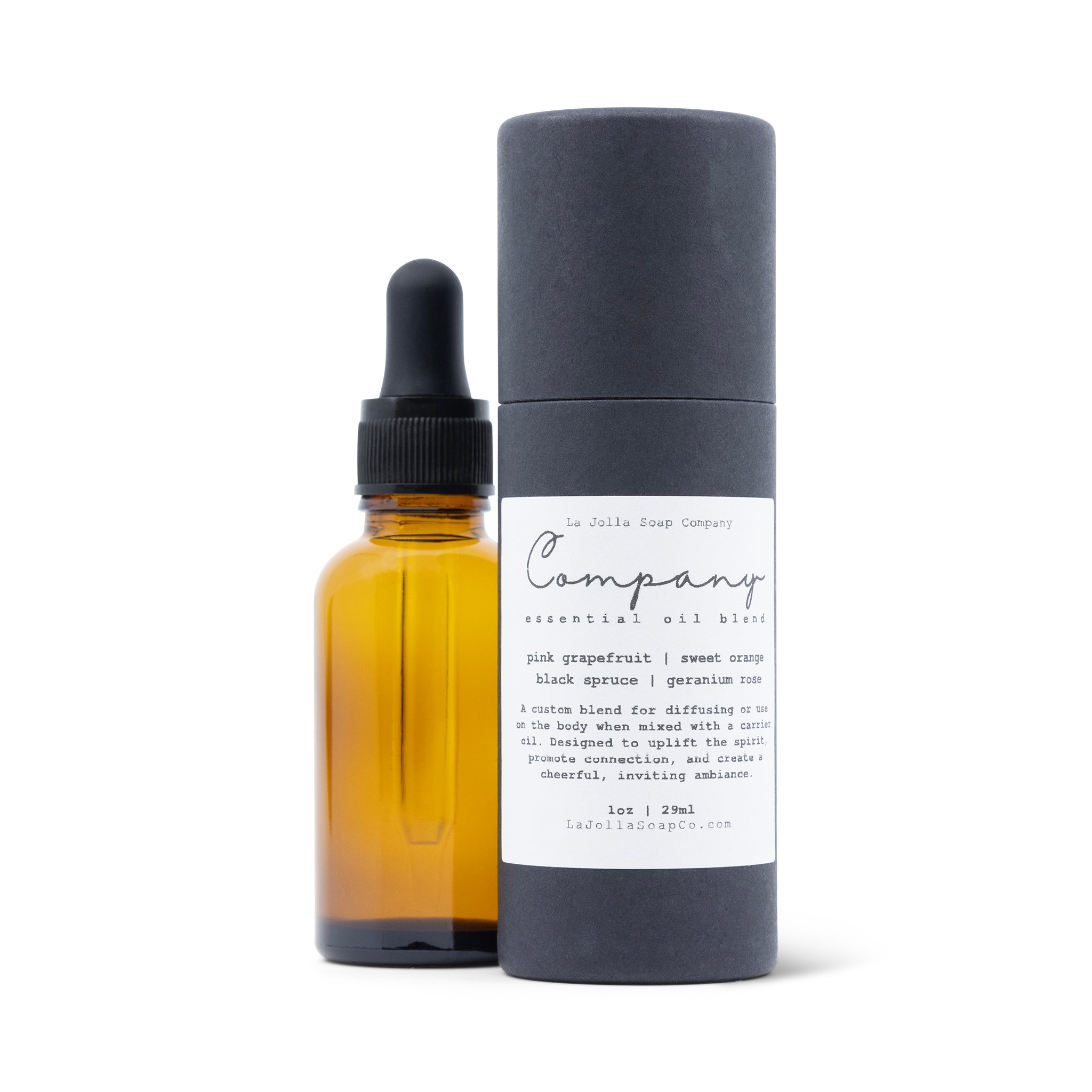 Custom essential oil blend "Company" An amber glass with dropper set next to  a sleek black package against a clean  natural white backdrop. 